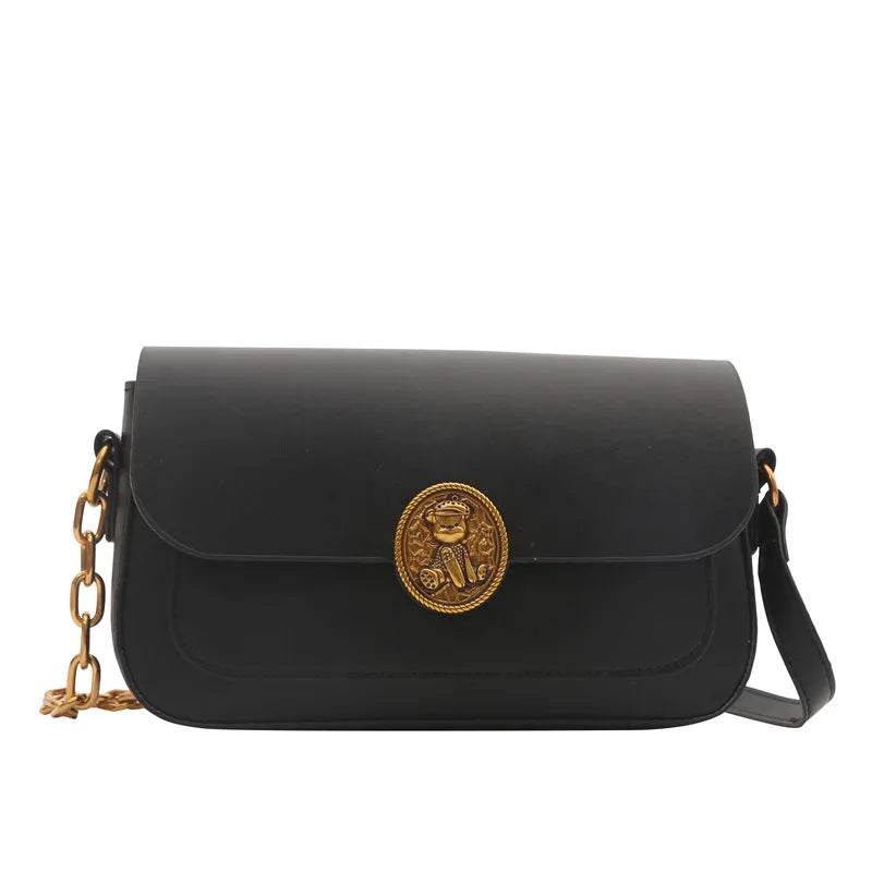 Bolso blanco pequeño con cadena