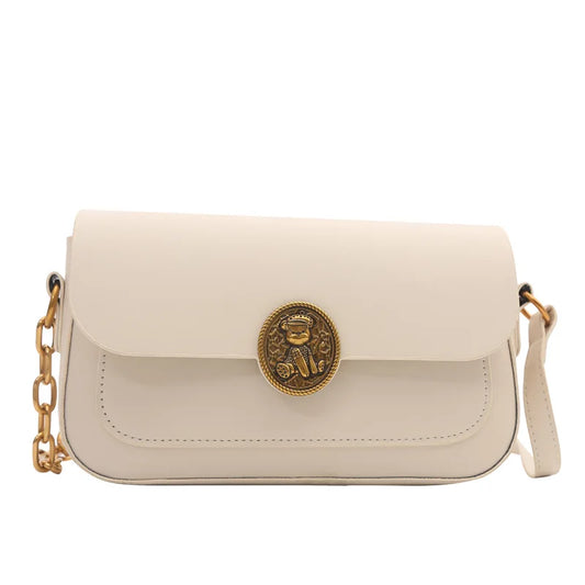 Bolso blanco pequeño con cadena