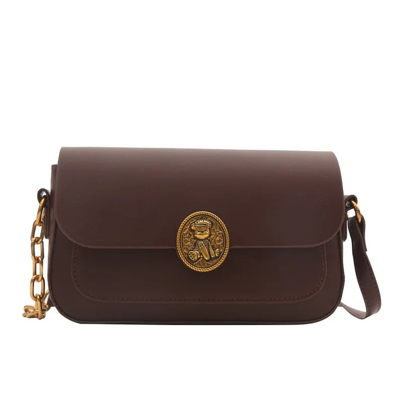 Bolso blanco pequeño con cadena