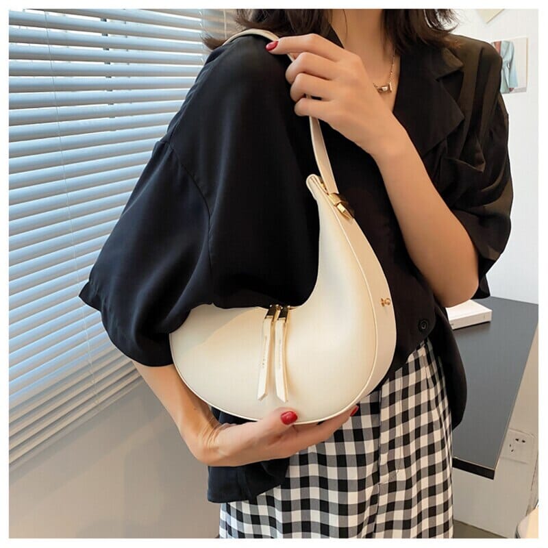 Dumpling Clutch The Store Bags