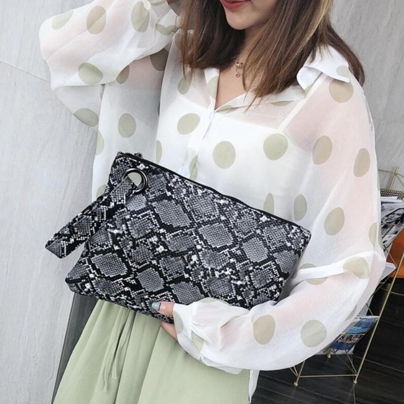 Snake Print Leather Clutch Bag The Store Bags