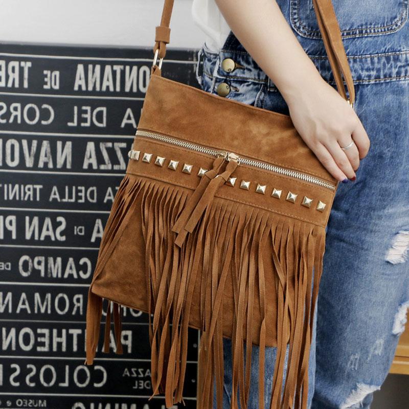 Leather crossbody bag with fringe and rivet The Store Bags