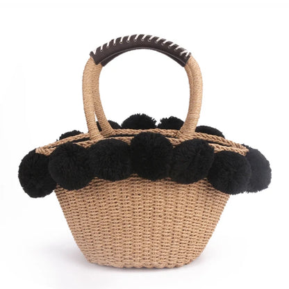 Bolso de paja con pompones