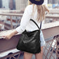 Bolso de hombro con piel