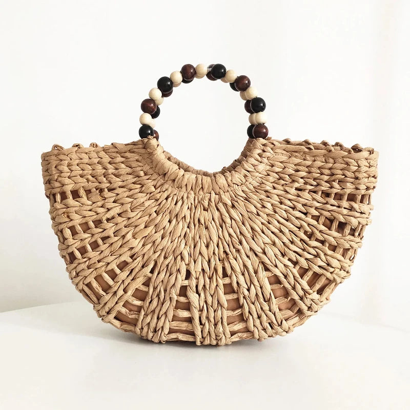 Bolso de paja con pompones