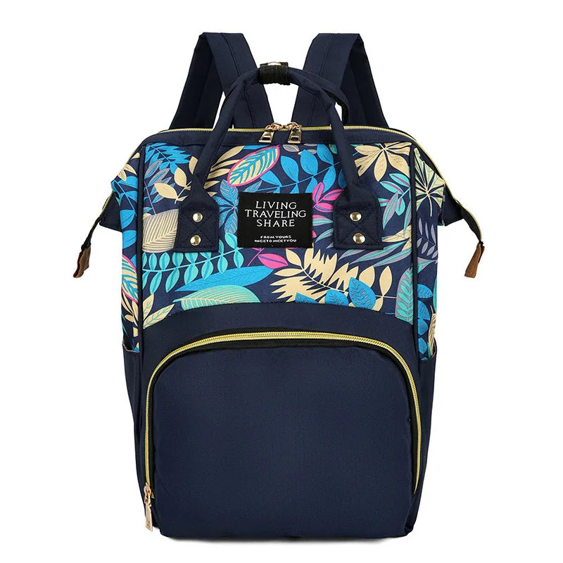 Mochila con bolsa de pañales de flores
