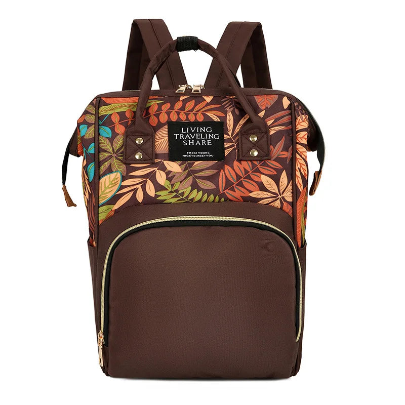 Mochila con bolsa de pañales de flores