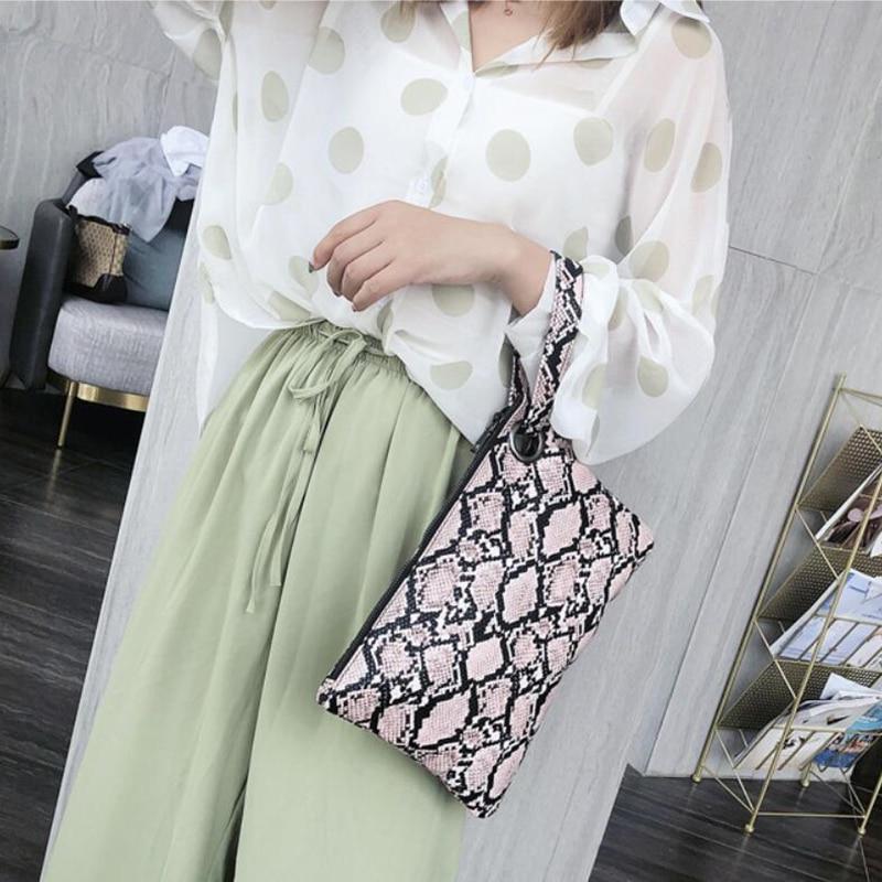 Snake Print Clutch Bag The Store Bags 