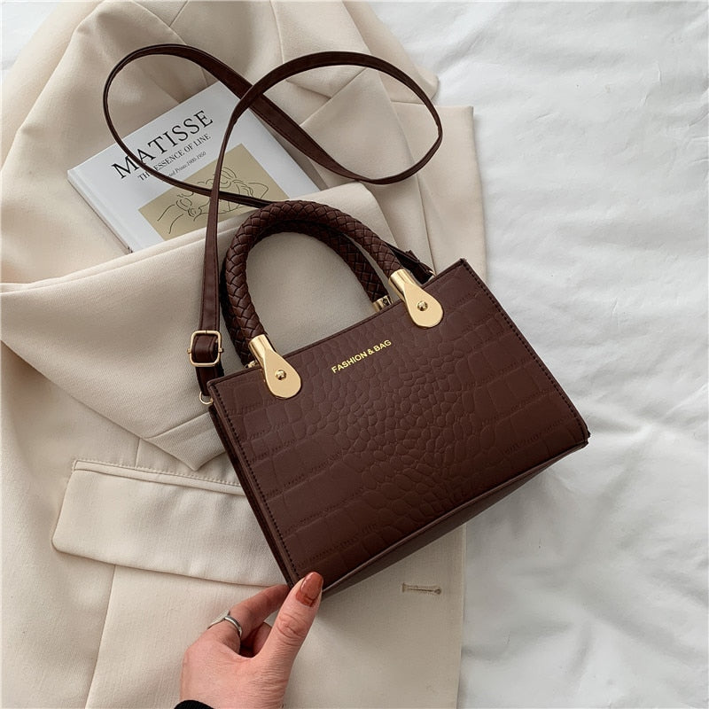 Small Leather Clutch With Strap The Store Bags coffee color 