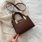 Small Leather Clutch With Strap The Store Bags coffee color 