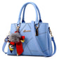 Leather Handbag With Pom Poms The Store Bags Sky blue 